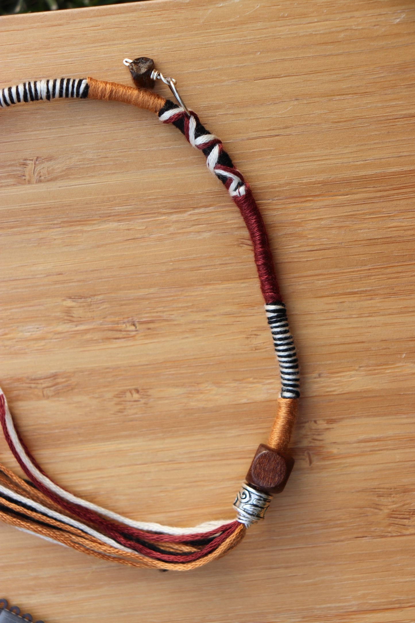 Maroon, Gold, Cream, and Black Clip In Hairwrap